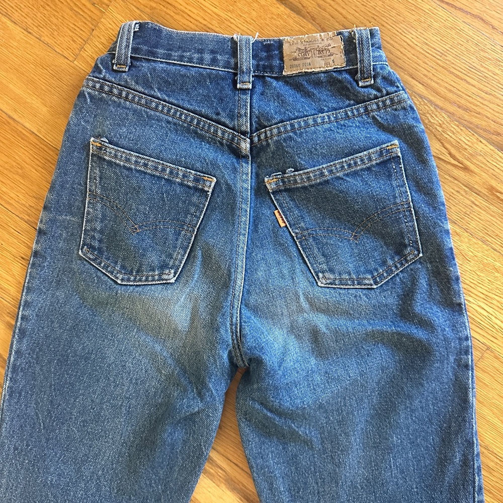 Vintage high waisted orange tab Levi’s 22” waist